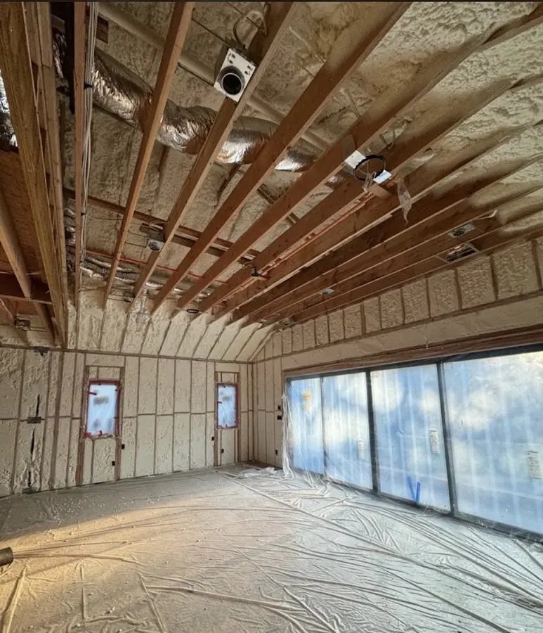 Interior walls and ceiling insulated with spray foam during new construction in Columbia